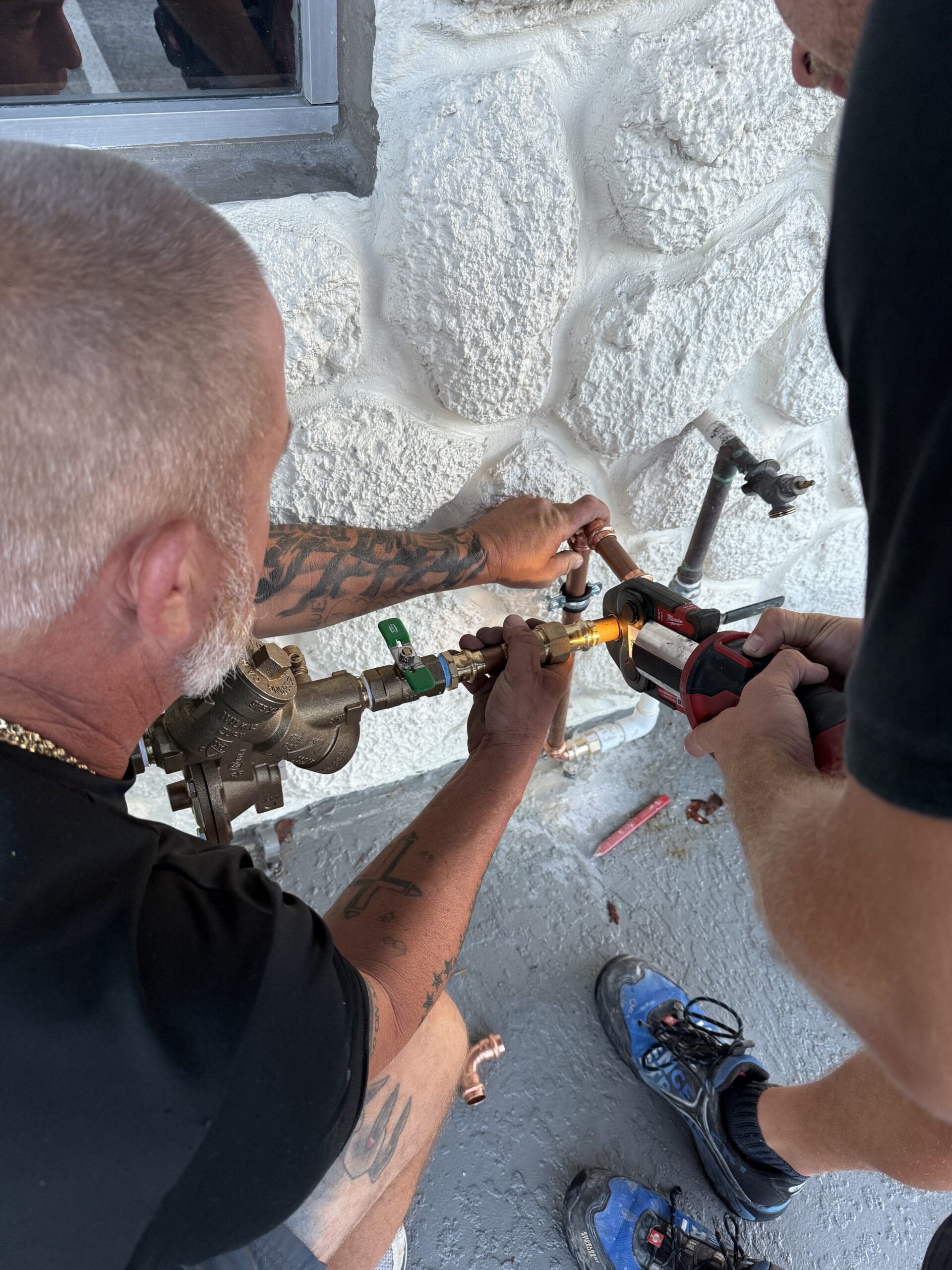 Aqua Vita crew installing a copper repipe and backflow preventer in Cape Coral