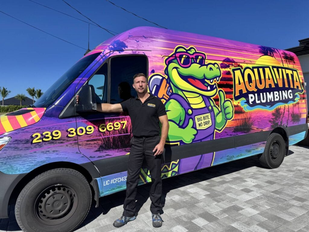 Aqua Plumbing Expert with his company car